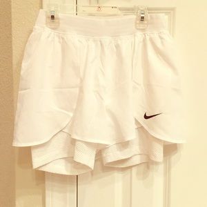 White Nike shorts + spandex